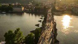 Pedestrian Crowded Charles Bridge Czech aerial at sunset Stock Footage