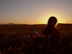 SLO MO Girl blowing dandelion to make a wish Stock Footage