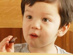 Boy Eats Chocolate V.2 (HD) Stock Footage