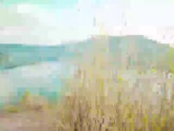 MS TU T/L View of sunset over taal volcano and lagoon / Taal, Philippines Stock Footage