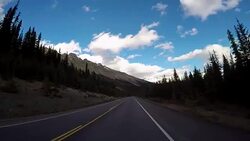 POV vehicle driving on scenic road Stock Footage