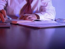 Businessmen working overtime, office, executive, boss. Business documents, charts, glasses. Stock Footage