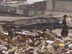 MS TS Man pulling out carriage / Lagos, Nigeria Stock Footage
