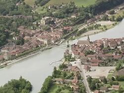 WS AERIAL View of river with bridge at Seyssel city / Rhone Alpes, France Stock Footage
