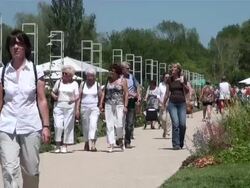 MS People roaming at national garden exhibition / Koblenz, Rhineland-Palatinate, Germany Stock Footage