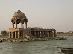 Architectural structure in the lake, Gadisar Lake, Jaisalmer, Rajasthan, India Stock Footage