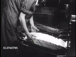 1940: VATICAN CITY: NEWSPAPER: EXT Sign for L' Osservatore Romano offices. Men running newspaper printing press, collecting folded copies. Editor Count Giuseppe Dalla Torre di Sanguinetto in office looking over paper at desk (to 1958, replaced after 4 Instructional Video