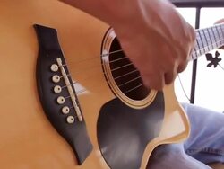 Playing the acoustic guitar Stock Footage