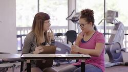 Speech therapist working with a teenage patient Stock Footage