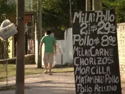 MS Shot of hand written board on town road / Buenos Aires, Argentina Stock Footage