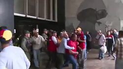 VOICED : Opositores y chavistas a los golpes en Caracas News Clip