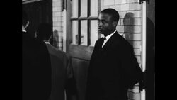 Jefferson Thomas, one of the original 'Little Rock Nine', returns to Central High School after 7 years Stock Footage