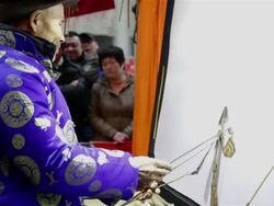 MS Folk artists showing Chinese shadow play with traditional music instrument during Chinese spring festival AUDIO / xi'an, shaanxi, china Stock Footage