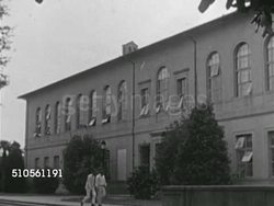 1939: LOUISIANA SCANDALS: TU WS Louisiana State University Memorial Tower, WS Thomas Atkins Hall w/ students walking quad, Angled WS Building. VS LSU President Dr. James M. Smith getting off aircraft from Canada, being escorted by plainclothes police Instructional Video