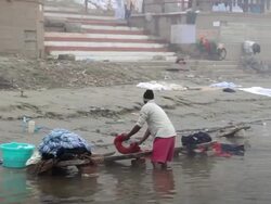 WS POV View of Varanasi on River Ganges in Morning Fog / Varanasi, India  Stock Footage
