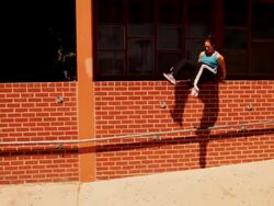 Girl doing Parkour - vaulting two obstacles Stock Footage