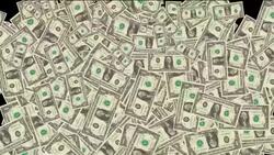 Computer-generated dollar bills spin and transition into reverse exposure in front of a black background. Stock Footage