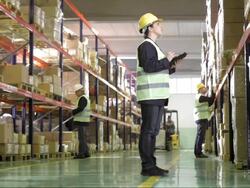 Warehouse Worker Using A Digital Tablet Stock Footage