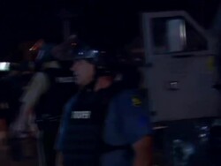 Clashes between protesters and police continue in Ferguson News Clip