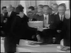 B/W 1963 man serving champagne to world leaders at signing of the Atomic Test Ban Treaty / newsreel Stock Footage