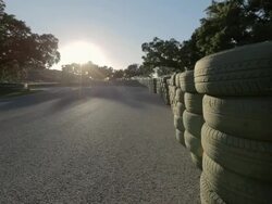 WS T/L View of sunset on Ascari race track in Spain at steep turn / Ronda, Malaga, Spain  Stock Footage