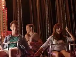 Young people on chairoplane Stock Footage