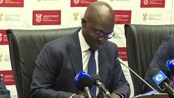 CLEAN : S.Africa's new FM admits junk status is blow to economy News Clip