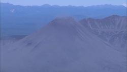 A volcano in the Kamchatka Peninsula spews ash. Stock Footage