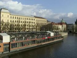MS Restaurant ship moored manes bridge in vltava river bank / Prague, Hlavni mesto Praha, Czech Republic Stock Footage
