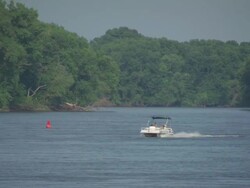 WS TS Boat moving in Hannibal Mississippi river / Hannibal, Missouri, United States Stock Footage