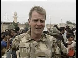 GWT: British forces distribute water to locals, voxpops News Clip