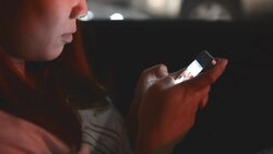 HD:woman touching smartphone in the car Stock Footage