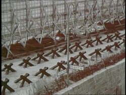 The concrete blocks and barbed wire of the Berlin Wall divide the city between East Germany and West Germany. Stock Footage