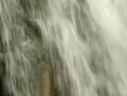 A waterfall in a natural park Stock Footage