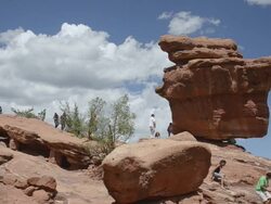 MS Tourist roaming at garden of the gods single rock called balanced rock / Colorado Springs, Colorado, United States Stock Footage