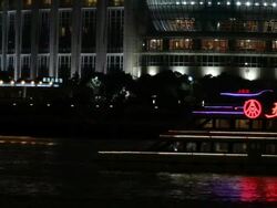 MS PAN Person walking past colorful neon lights / Shanghai, China Stock Footage
