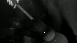 TS Craftsman blowing and spinning molten glass into cylinders Stock Footage