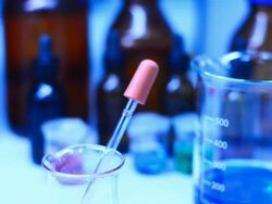 Mixing liquid in beaker Stock Footage