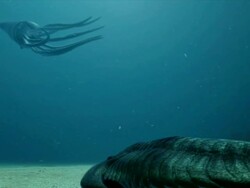 Low Angle pan-right - A prehistoric octopus undulates above another massive prehistoric sea creature. /  Stock Footage