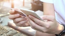 woman hands holding credit card and using smart-phone. Online shopping Stock Footage
