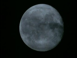 CU Full moon against black sky Stock Footage