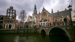 HD time-lapse: Amsterdam Canal with Old Church Netherlands Stock Footage