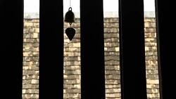 Moving of bell at Buddhist Temple Window Stock Footage