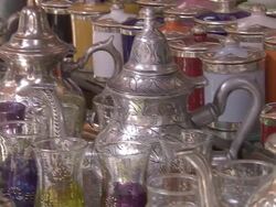 MS ZU Pan view of Arabic tea glasses in Market / Marrakech, Morocco Stock Footage