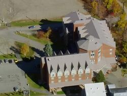 WS ARIEAL ZO View of Building with parking area /Maine, United States Stock Footage