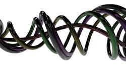 Shiny, coiled cables shift against a white background. Stock Footage