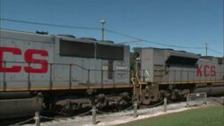 A freight train passes near St. Louis Cathedral in New Orleans. Stock Footage