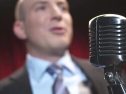 HD: Comedian Talking Into Microphone Stock Footage