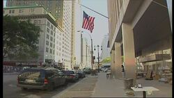 Damaged office buildings next to WTC News Clip