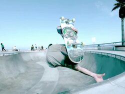 MS SLO MO Shot of Guy doing invert trick in skate park bowl / Venice, California, United States Stock Footage